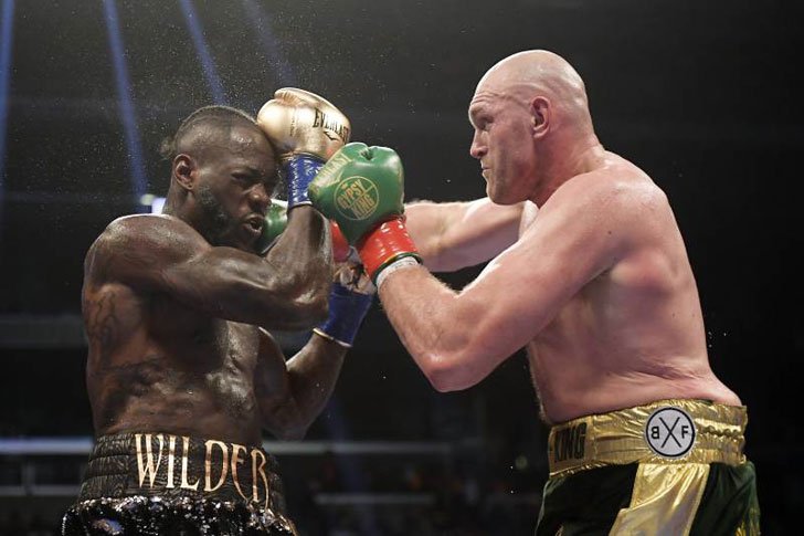 Deontay Wilder with Tyson Fury