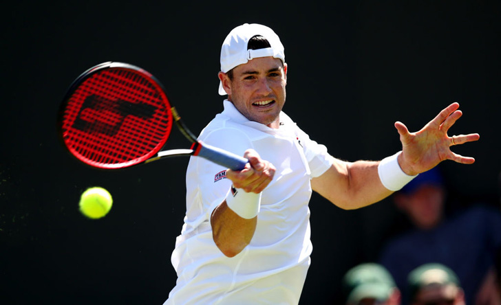 John Isner with the Atlanta Open Open trophy.